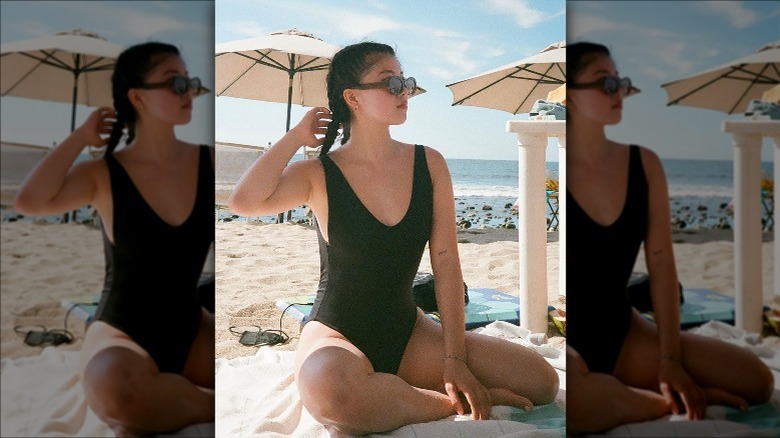 Woman wearing a black swimsuit 