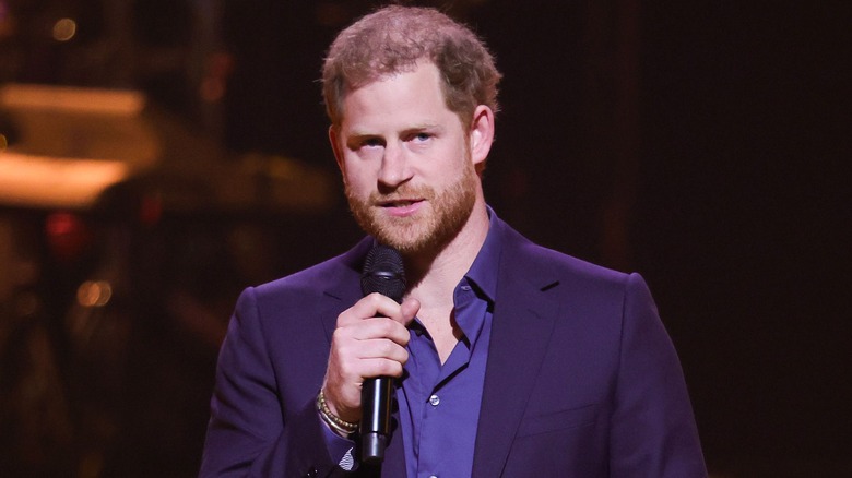 Prince Harry talking into a microphone