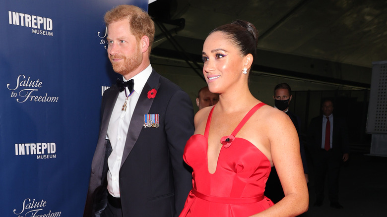 Prince Harry and Meghan Markle at a gala 