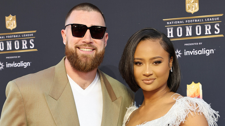 Travis Kelce and Kayla Nicole posing