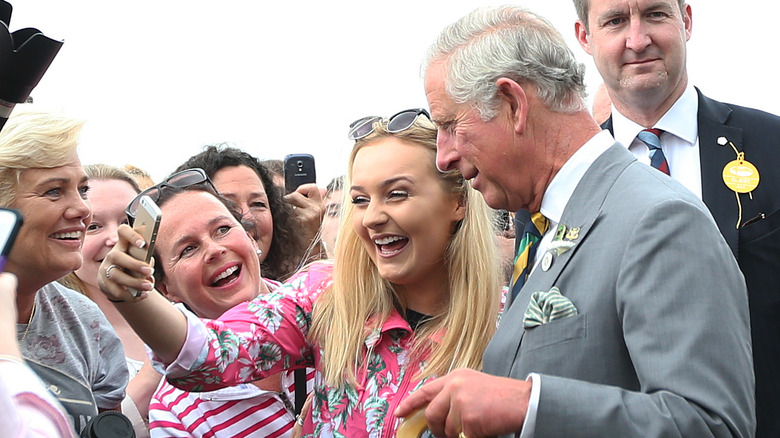 Fans taking a selfie with King Charles 