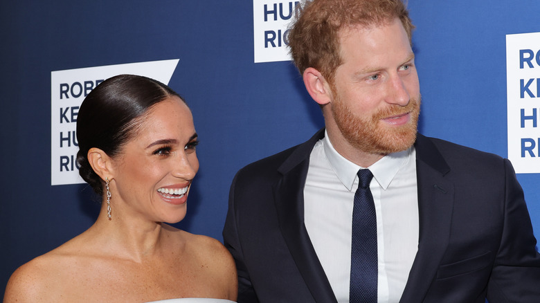 Meghan Markle and Prince Harry smiling 