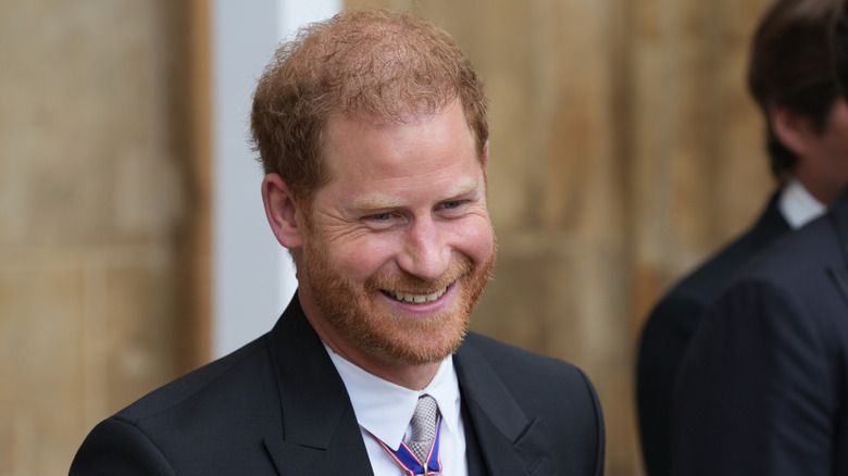 Prince Harry smiling at the coronation