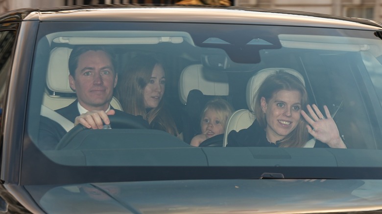 Edoardo Mapelli Mozzi, Sienna Mapelli Mozzi, and Princess Beatrice sitting in a car