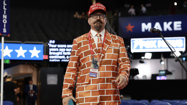 Blake Marnell posing in brick suit