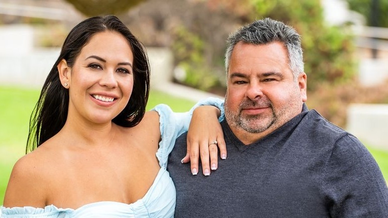 Ed and Liz pose in a promo shot for 90 Day Fiancé: Happily Ever After 