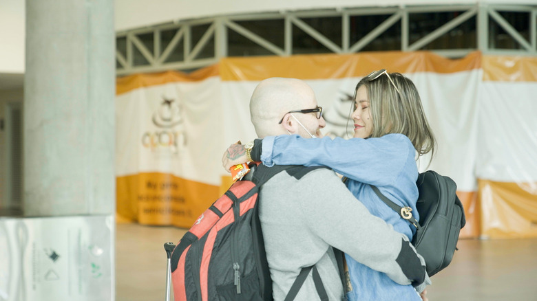 Mike and Ximena embracing