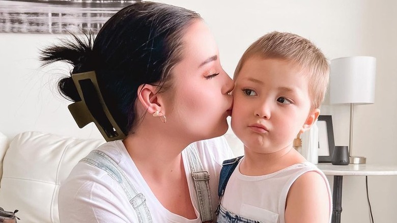 Deaven Clegg kissing son