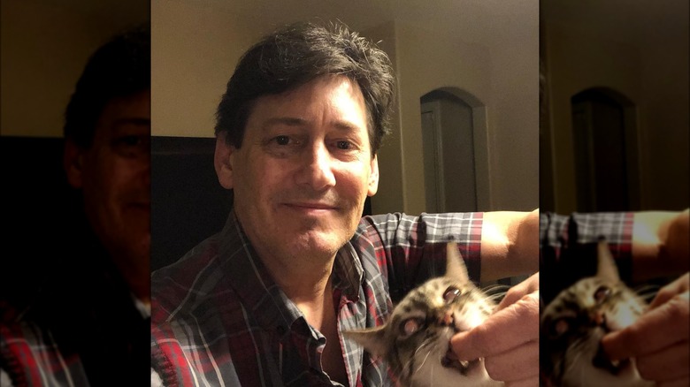 David Murphey in selfie with cat