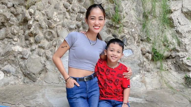 Rose Vega and son, smiling together