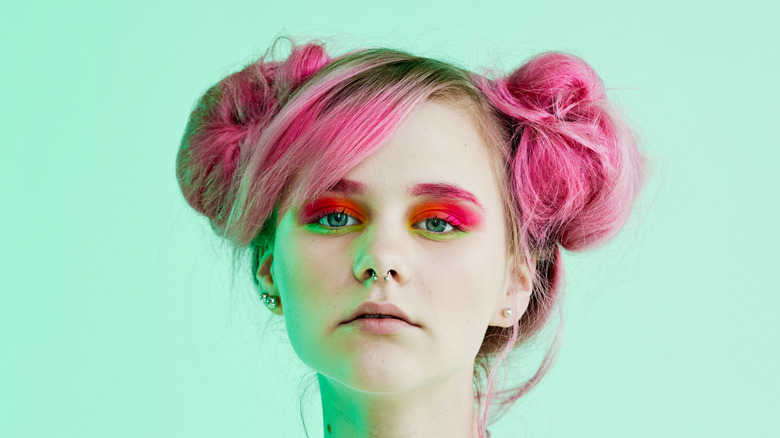 woman with pink space buns