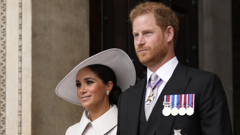 Prince Harry & Meghan Markle standing together