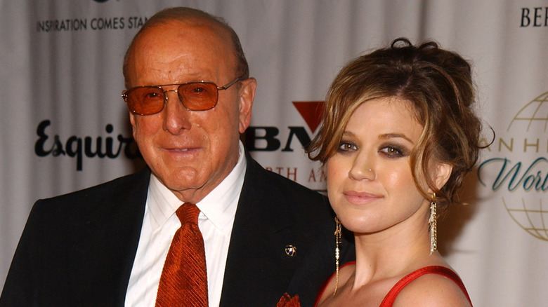 Clive Davis and Kelly Clarkson posing