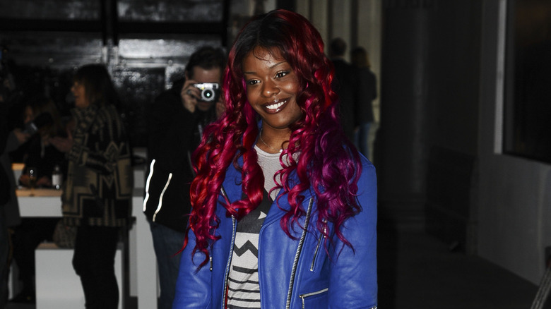 Azealia Banks with long, red curly hair