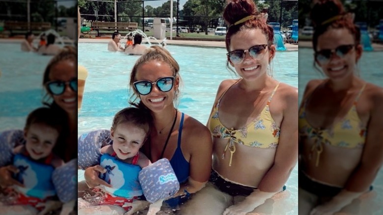 Brooke, Baylee, and Ace in a pool 