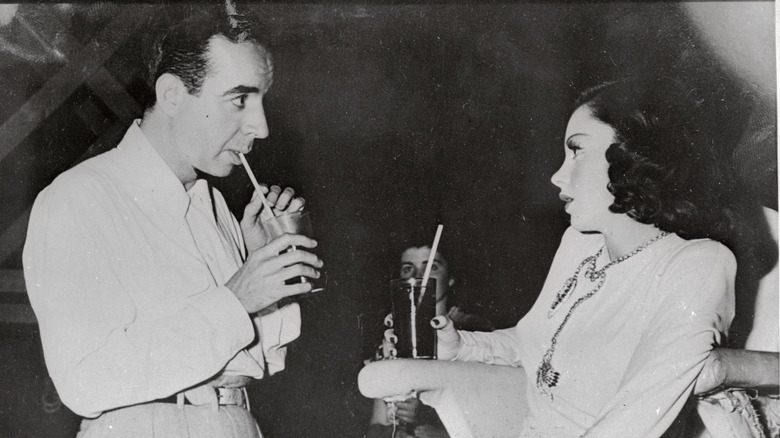 Vincente Minnelli and Judy Garland looking into each other's eyes