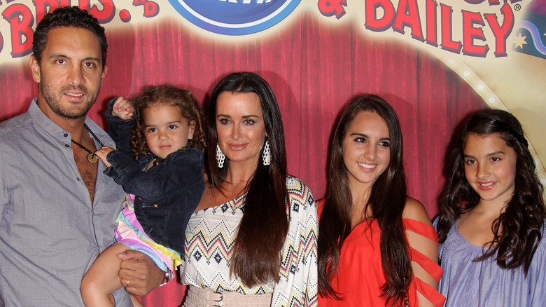 Kyle Richards, Mauricio Umansky, three daughters