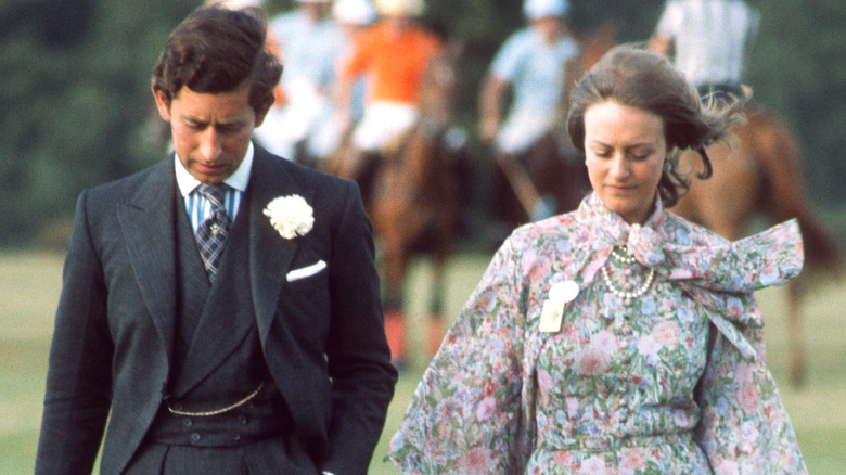 Prince Charles and Caroline Longman walking 