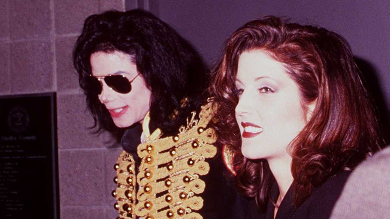 Lisa Marie Presley and Michael Jackson smiling