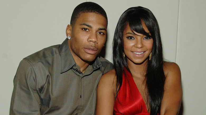 Ashanti and Nelly posing together