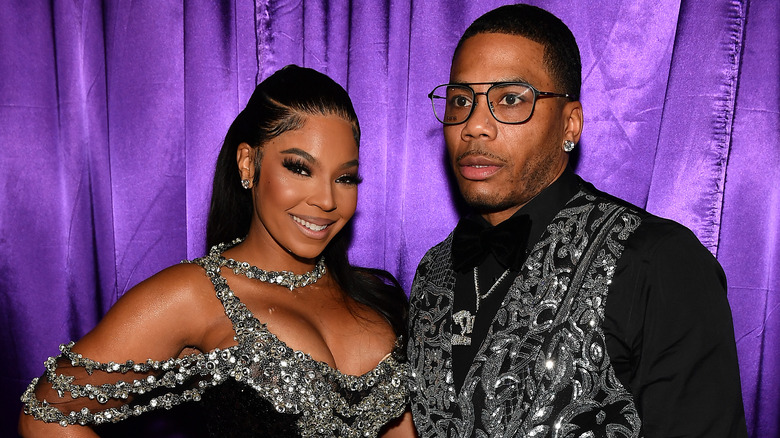 Ashanti and Nelly posing together