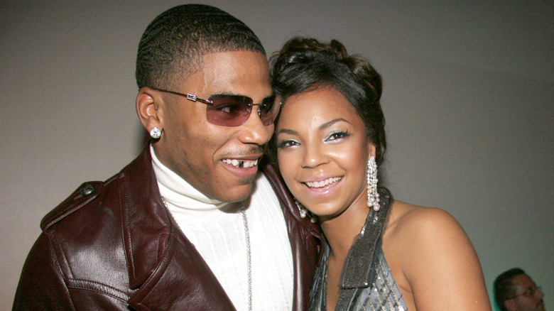 Nelly and Ashanti hugging