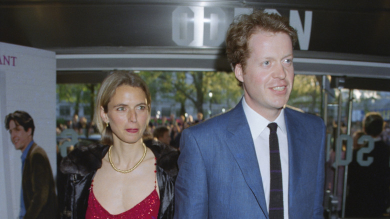 Caroline Freund looking thoughtful and Charles Spencer smiling