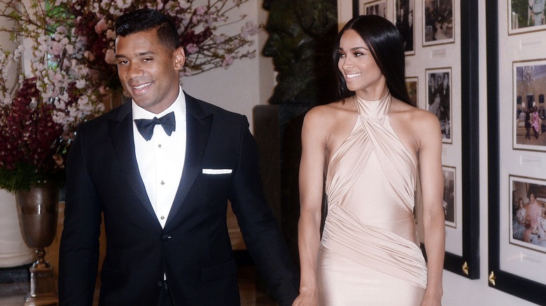 Ciara and Russell Wilson walking at White House