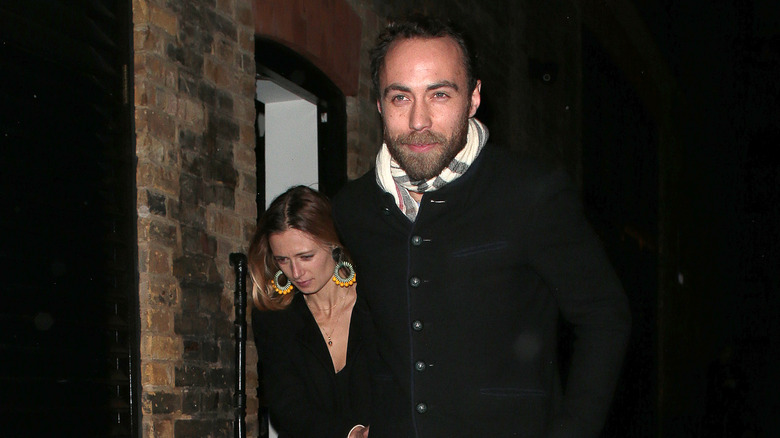 Alizee Thevenet and James Middleton walking