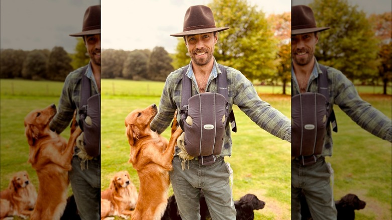 James Middleton with baby and dogs