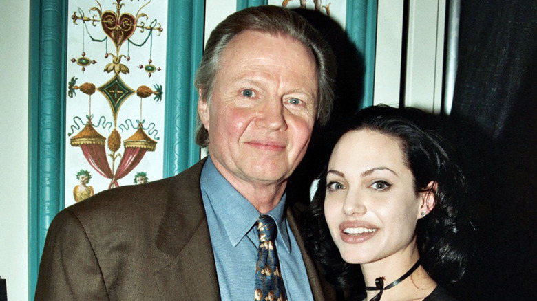 Angelina Jolie posing for photos with father Jon Voight