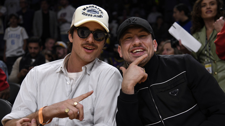 Jacob Elordi and Barry Keoghan at a basketball game 