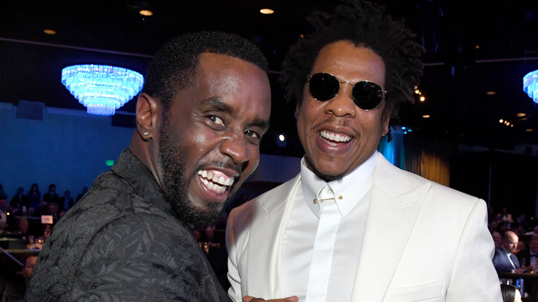 P. Diddy and Jay-Z pose and smile for the camera