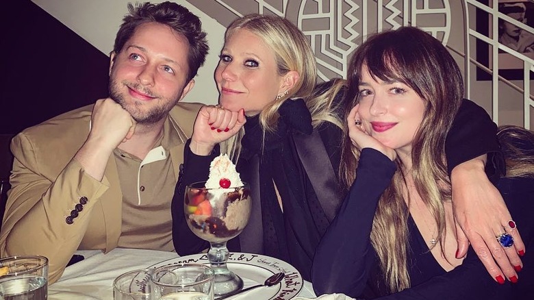 Derek Blasberg, Gwyneth Paltrow, Dakota Johnson hanging together