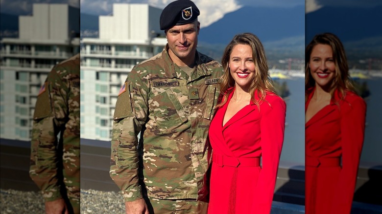 David Lemanowicz in a military uniform posing with Jill Wagner