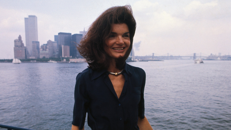 Jackie Onassis Kennedy looking off to the side