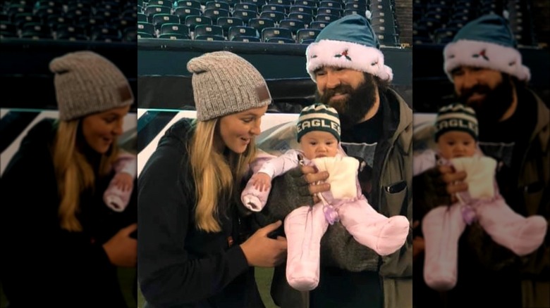 Kylie and Jason Kelce holding baby Wyatt Kelce