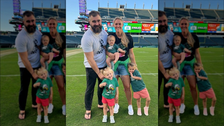 The Kelce family on a football field