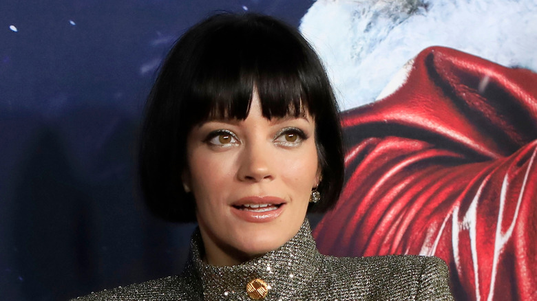 Lily Allen smiling open-mouthed