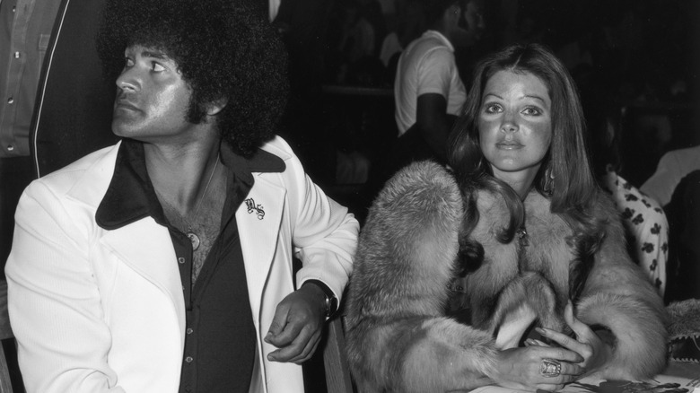 Michael Stone and Priscilla Presley black and white