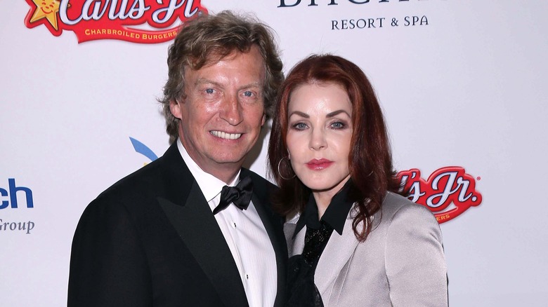 Nigel Lythgoe and Priscilla Presley posing