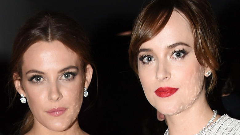 Riley Keough and Dakota Johnson attend the 2015 Guggenheim International Gala Dinner