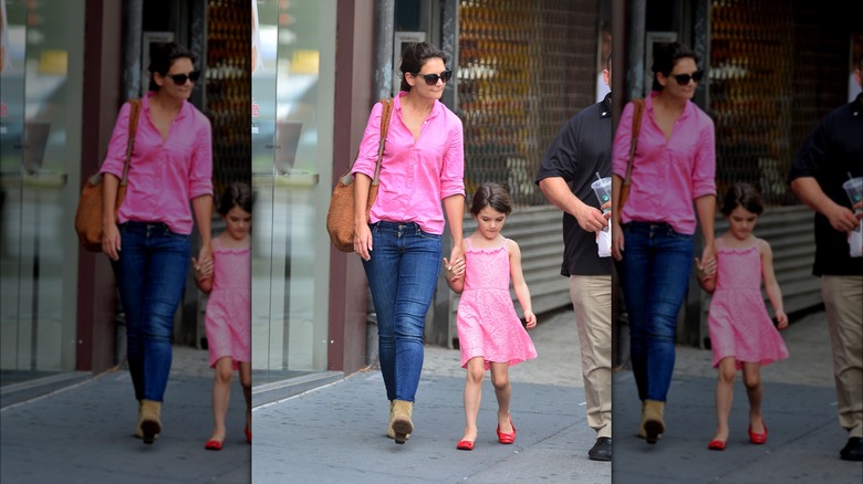 Katie Holmes walking with toddler daughter Suri Cruise 