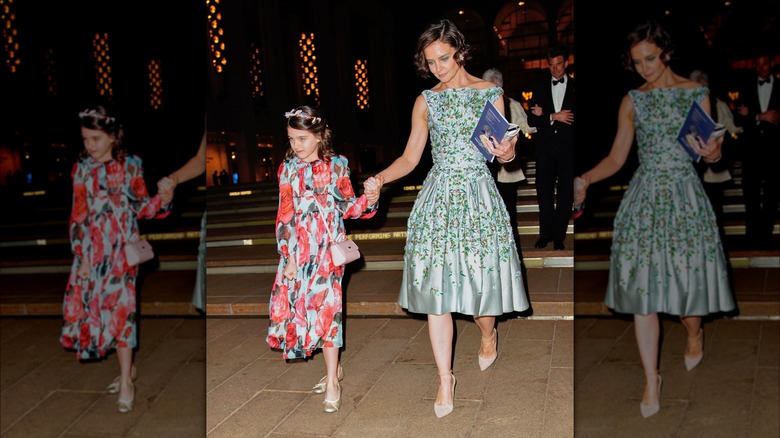 Suri Cruise walking down steps with mother Katie Holmes