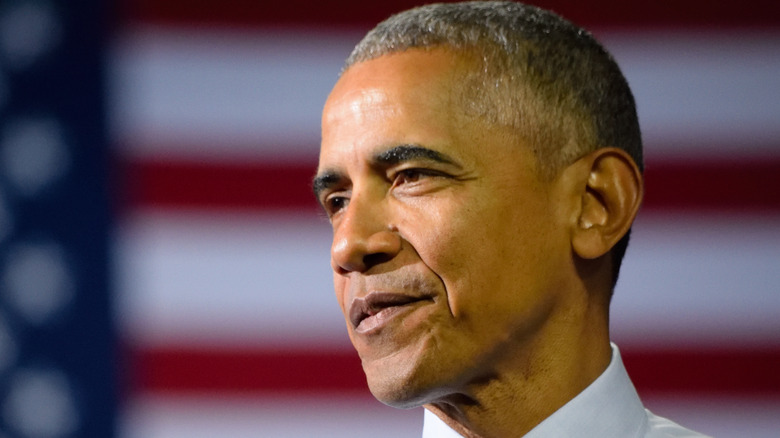 Barack Obama with the US flag in the background 