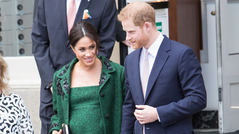 Prince Harry and Meghan Markle smiling