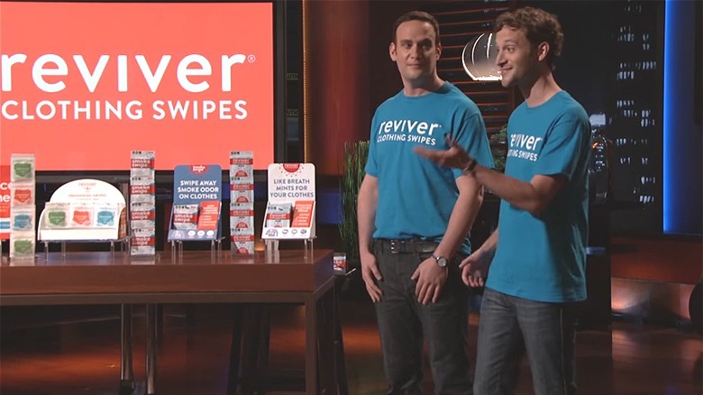 Ben and Eric Kusin in front of Reviver products