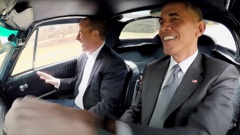 Jerry Seinfeld and Barack Obama laughing and driving together