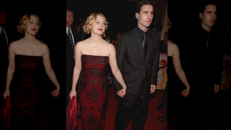 Drew Barrymore and Luke Wilson holding hands