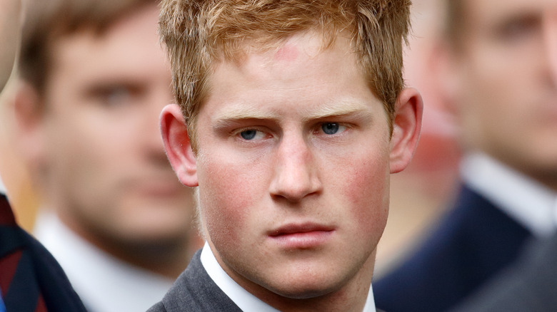 Prince Harry frowning